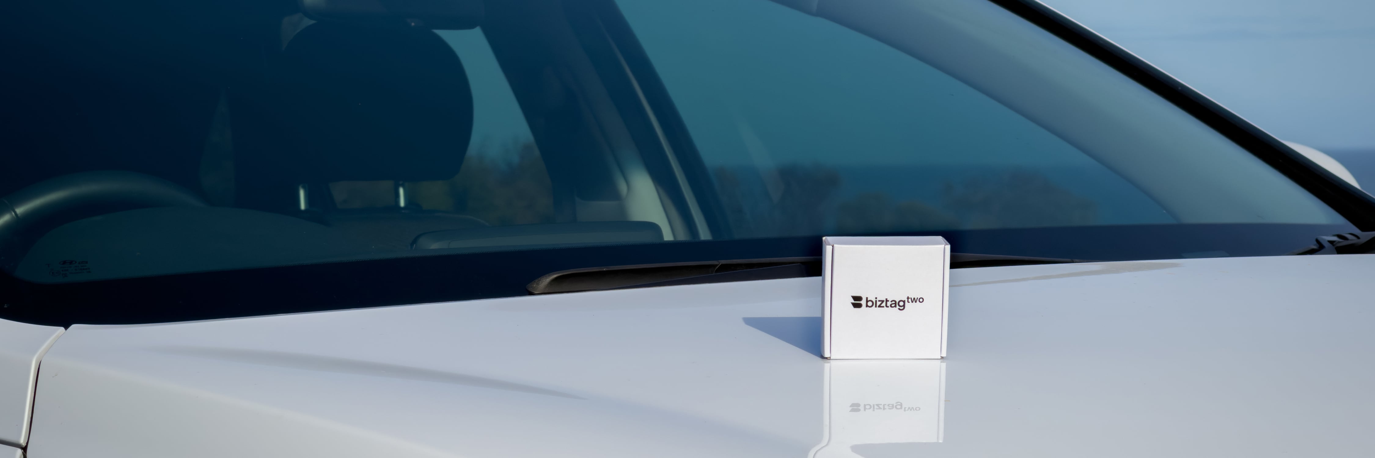 Biztag Two product packaging on a car