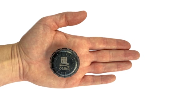 Biztag Two shown in hand for scale Biztag Two shown in hand for scale